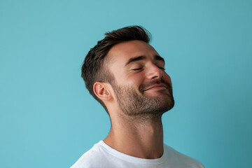 Fototapeta premium A close up of a man's face with his eyes closed