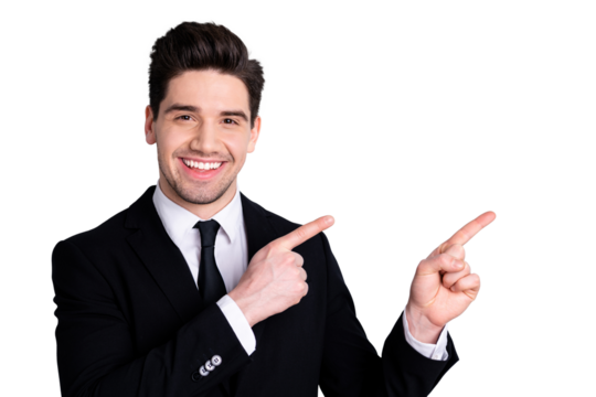Close up photo amazing toothy he him his macho attractive handsome hand arm index finger direct indicate empty space wear white shirt black suit jacket tie formal-wear isolated bright grey background