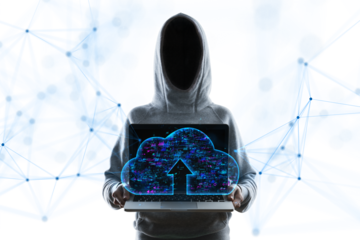 Faceless person in a hoodie holding a laptop with a holographic cloud upload symbol, standing against a white, digital, cyber background. Concept of data security and cloud computing