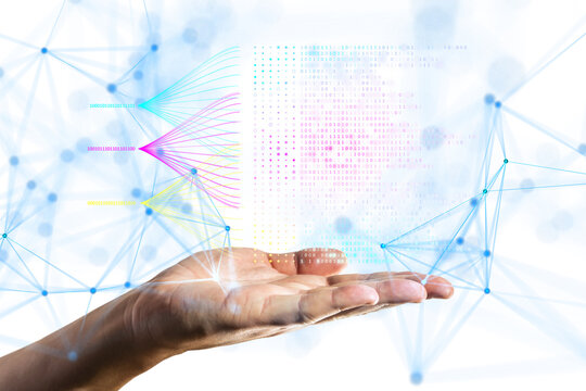 A hand holding digital data streams, visualized with binary code and colored lines, on a white background. Concept of data analysis
