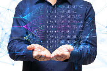 Man in a blue shirt holding a holographic digital data visualization with binary code and network connections on a white background, illustrating data analysis and technology concepts