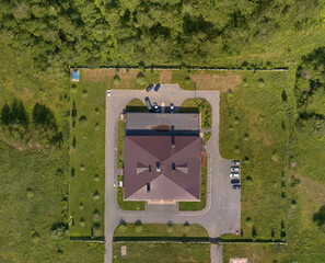 Building with Grounds in a Field Among Trees, Top View