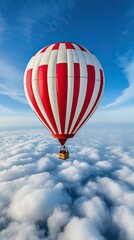 Fototapeta premium A hot air balloon drifts above the clouds, surrounded by a bright blue sky, capturing the spirit of adventure and the joy of flight on a beautiful day