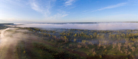 Misty Morning Over Countryside Fields