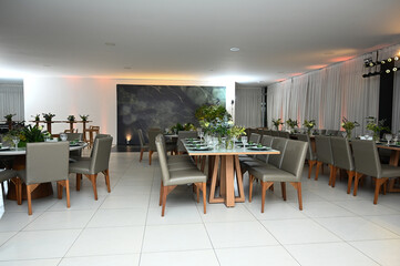 table set for a wedding reception, interior of a restaurant, room interior, table setting at restaurant, table setting, wedding table setting, table set for a dinner, table setting for a dinner