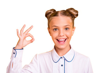 Close-up portrait of her she nice attractive lovely sweet cheerful cheery confident optimistic pre-teen girl wearing white shirt showing ok-sign isolated on bright vivid shine yellow background