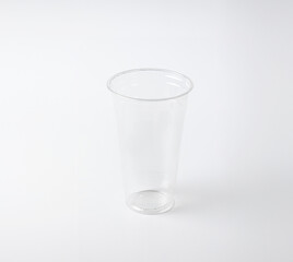 Mockup of an empty plastic cup on white background