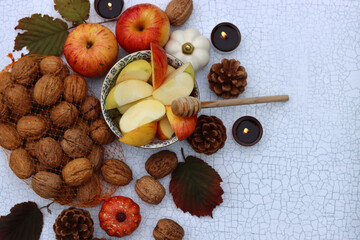 Apples and honey, Jewish new year's symbols top view photo. Rosh Hashana celebration concept. Still life with autumn fruit. 