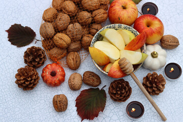 Apples and honey, Jewish new year's symbols top view photo. Rosh Hashana celebration concept. Still life with autumn fruit. 