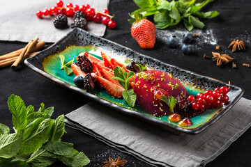 berry mousse with strawberries, blackberries and red currants