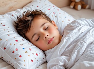 Obraz premium A little boy resting peacefully in his bed