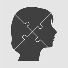 Female head made from puzzle pieces