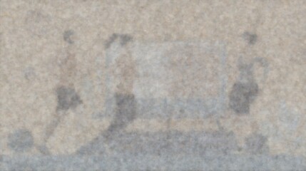 Fototapeta premium An abstract photograph of three blurry figures in front of a faded out background.