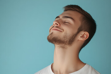 Fototapeta premium A close up of a man's face with his eyes closed