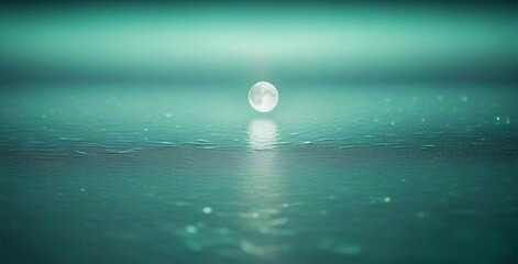 Full moon reflecting on a calm teal sea.