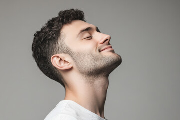 Obraz premium A close up of a man's face with his eyes closed