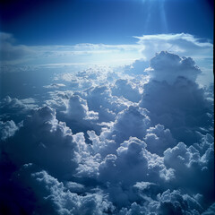 view from airplane window clouds above the sky