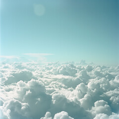 view from airplane window clouds above the sky