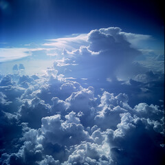view from airplane window clouds above the sky