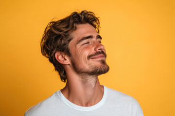 Obraz premium A close up of a man's face with his eyes closed