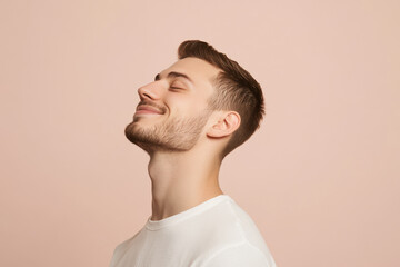 Obraz premium A close up of a man's face with his eyes closed