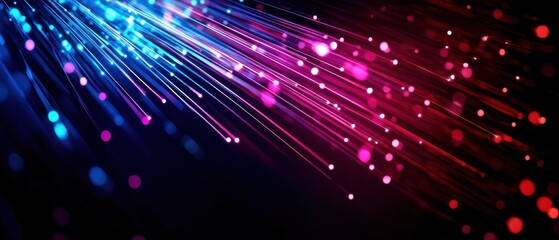 Vibrant light trails in blue and red create a stunning abstract background, perfect for technology or creativity themes.