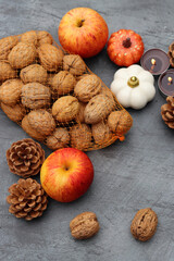 Autumn still life against dark textured background with space for text. 