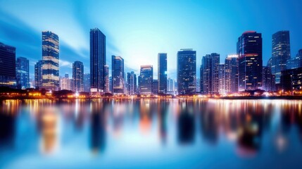 Fototapeta premium Stunning city skyline at dusk, showcasing vibrant buildings reflected in calm water, creating a serene urban atmosphere.