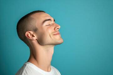 Fototapeta premium A close up of a man's face with his eyes closed