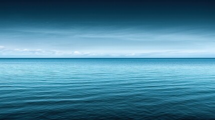 Obraz premium Peaceful ocean horizon with tranquil blue water and a serene sky. Perfect for calming and serene backgrounds or nature scenes.