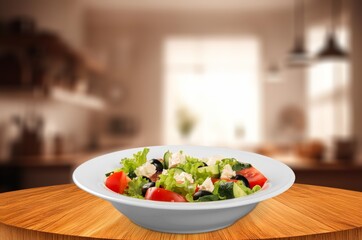 Caesar Salad with fresh vegetables and dressing.