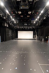 Empty Stage with Black Curtains and Lighting Equipment