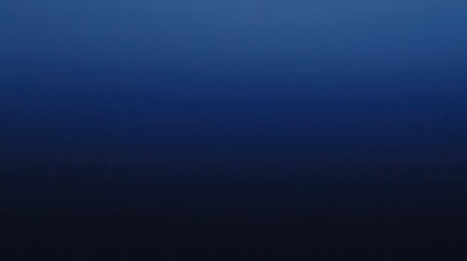 Obraz premium A smooth gradient transitioning from dark blue to black.