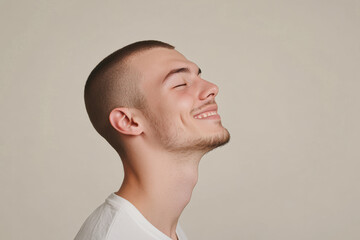 A close up of a man's face with his eyes closed