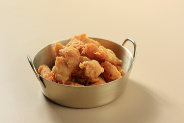 Crispy Popcorn Chicken on Stainless Bowl