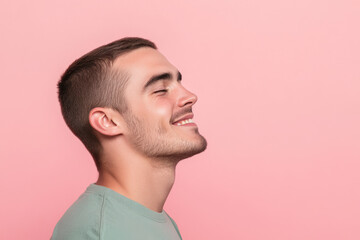 Obraz premium A close up of a man's face with his eyes closed