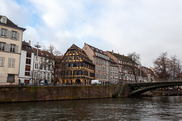 Fototapeta premium Bridges and old buildings on the embankment of the river Ile