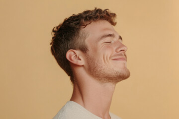 Fototapeta premium A close up of a man's face with his eyes closed