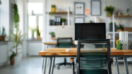Fototapeta premium Modern minimalist workspace featuring a standing desk and ergonomic chair optimizing productivity and comfort in a clean organized interior design