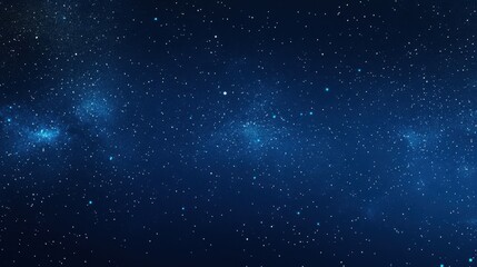 Obraz premium A starry night sky filled with twinkling stars against a dark blue backdrop.