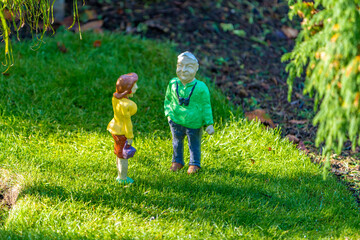 Fototapeta premium parent and child walking in park