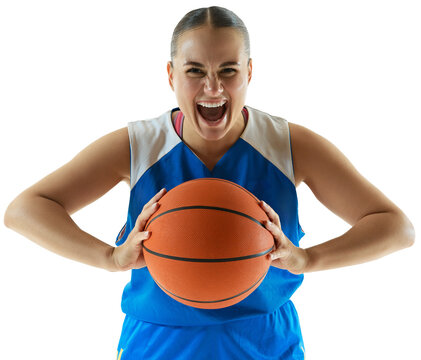 Emotional woman, basketball player holding ball and shouting of joy, celebrating victory against transparent background. Concept of professional sport, championship, tournament, hobby and recreation.