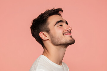 Fototapeta premium A close up of a man's face with his eyes closed