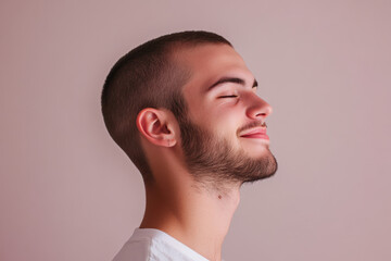 Fototapeta premium A close up of a man's face with his eyes closed