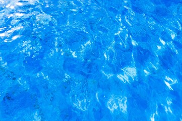 Blue water with soft ripples on the surface.
