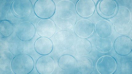 A textured blue background with overlapping circular shapes, creating a serene visual effect.