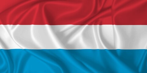Flag of Luxembourg waving in the wind on silk texture