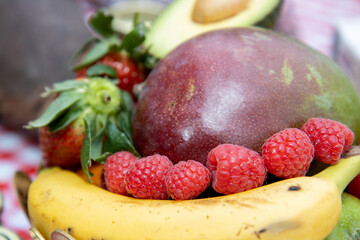 A delicious down of fruit showing a close up view of the ripe raspberries