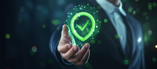 A businessman holds a virtual green check mark icon on a digital screen, symbolizing quality and service. He touches a shield hologram, blending technology and business concepts.

