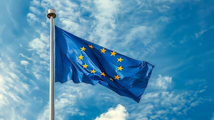 the flying flag of the european union against the high blue sky 